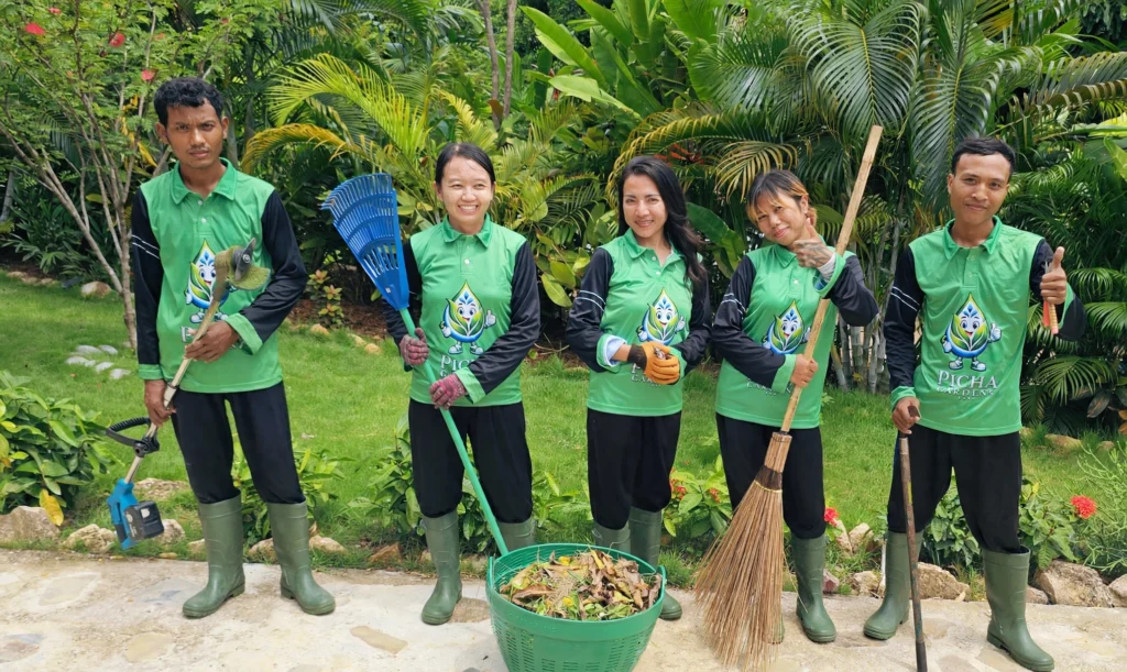 Picha Gardens team working on garden maintenance in Koh Phangan